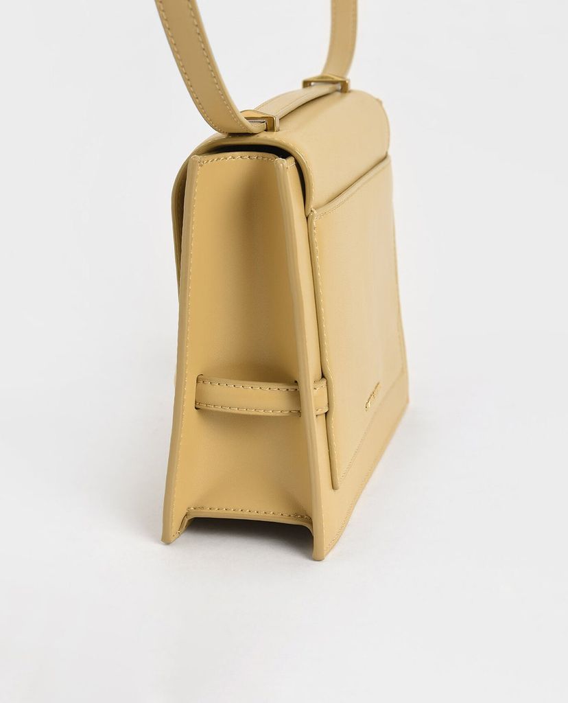 CHARLES & KEITH - Túi đeo chéo nữ Metallic Push Lock Crossbody Bag