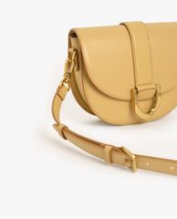 CHARLES & KEITH - Túi đeo vai nữ Metallic Buckle Saddle