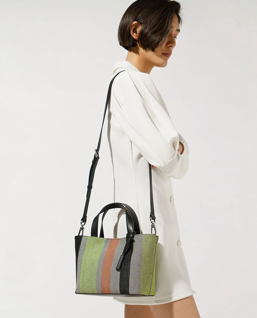 CHARLES & KEITH - Túi xách tay nữ Caged Canvas