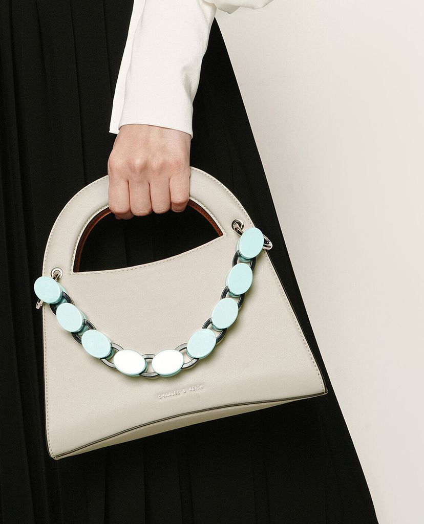 CHARLES & KEITH - Túi xách tay hình thang Acrylic Top Handle Sculptural