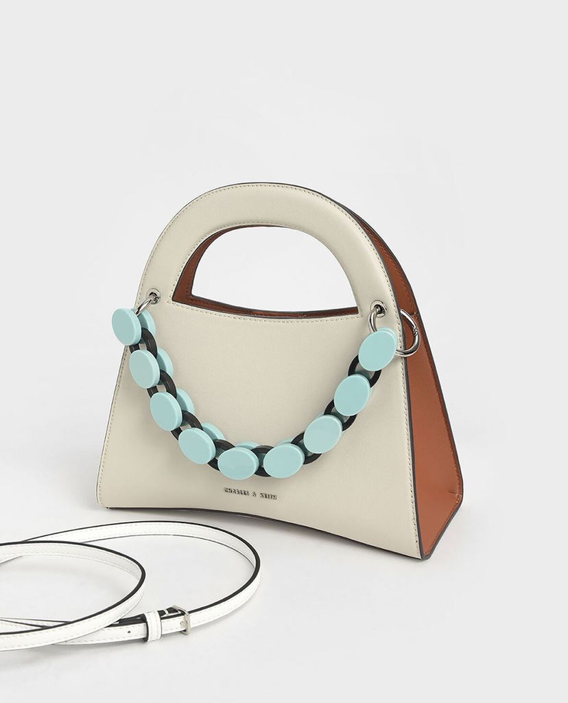 CHARLES & KEITH - Túi xách tay hình thang Acrylic Top Handle Sculptural