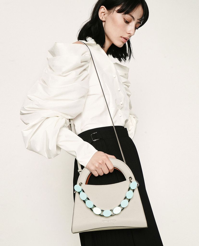 CHARLES & KEITH - Túi xách tay hình thang Acrylic Top Handle Sculptural