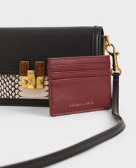 CHARLES & KEITH - Ví cầm tay nữ chữ nhật Stone Embellished