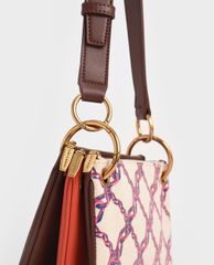 CHARLES & KEITH - Túi đeo chéo nữ tay cầm bằng kim loại thời trang