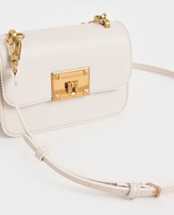 CHARLES & KEITH - Túi xách tay nữ hình chữ nhật Metallic Turn Lock