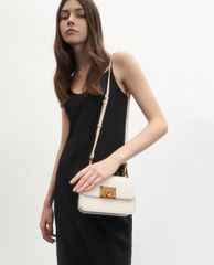 CHARLES & KEITH - Túi xách tay nữ hình chữ nhật Metallic Turn Lock