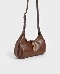 CHARLES & KEITH - Túi đeo vai nữ hình thang Metallic Accent Hobo
