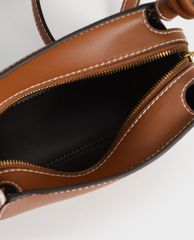 CHARLES & KEITH - Túi đeo vai nữ chữ nhật chi tiết tay cầm xoắn thời trang