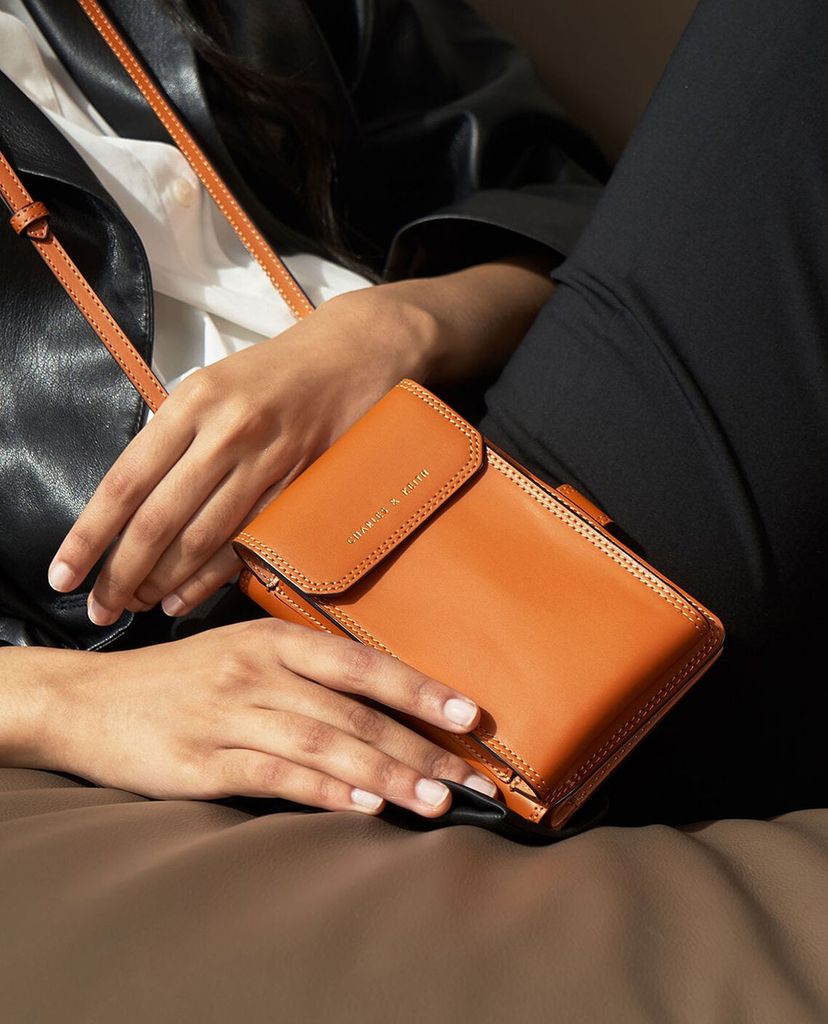 CHARLES & KEITH - Ví cầm tay nữ chữ nhật phối dây Elongated Pouch