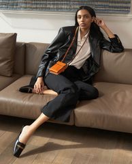 CHARLES & KEITH - Ví cầm tay nữ chữ nhật phối dây Elongated Pouch
