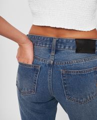 GIGI - Quần jeans nữ ống loe rách gối thời trang