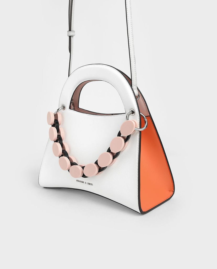 CHARLES & KEITH - Túi xách tay hình thang Acrylic Top Handle Sculptural