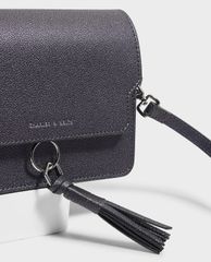 CHARLES & KEITH - Túi đeo chéo nữ chữ nhật phối chi tiết tua rua
