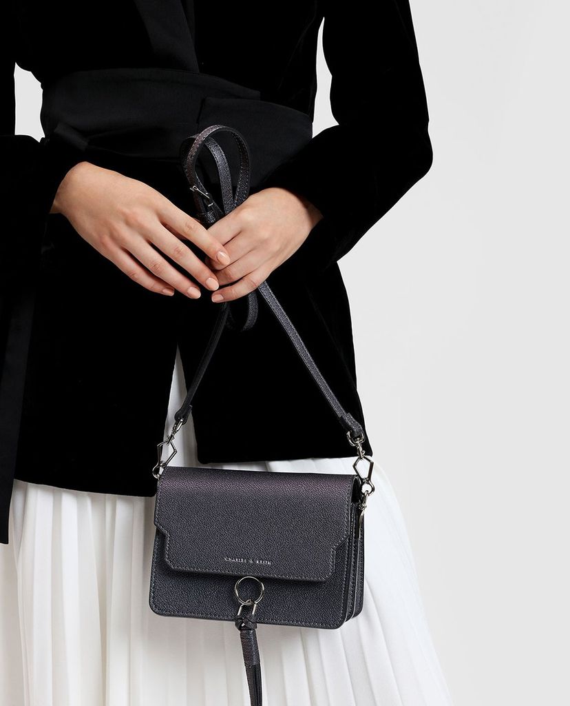 CHARLES & KEITH - Túi đeo chéo nữ chữ nhật phối chi tiết tua rua