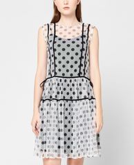 GIGI - Đầm mini sát nách cổ tròn xuyên thấu Tie Side