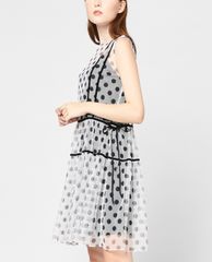 GIGI - Đầm mini sát nách cổ tròn xuyên thấu Tie Side
