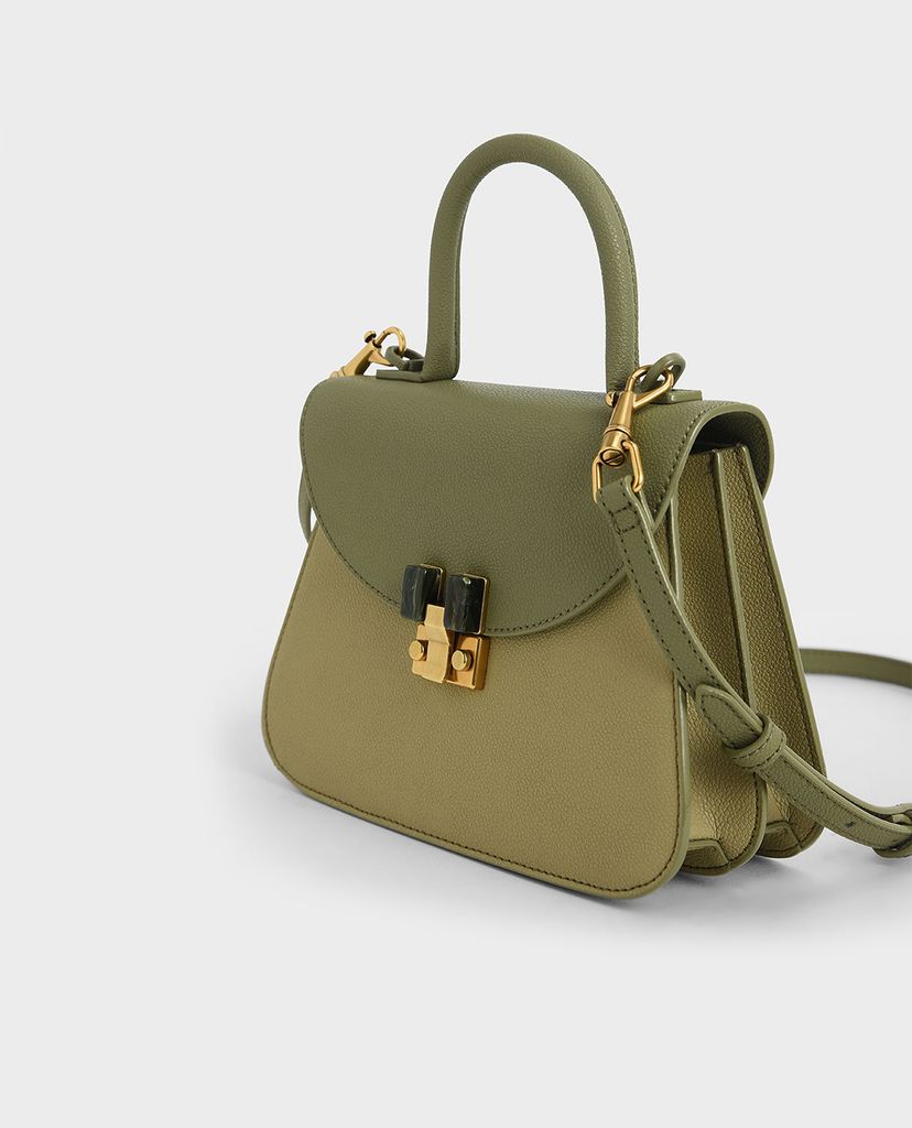 CHARLES & KEITH - Túi xách tay nữ hình thang Embellished Sculptural