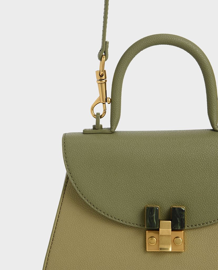 CHARLES & KEITH - Túi xách tay nữ hình thang Embellished Sculptural