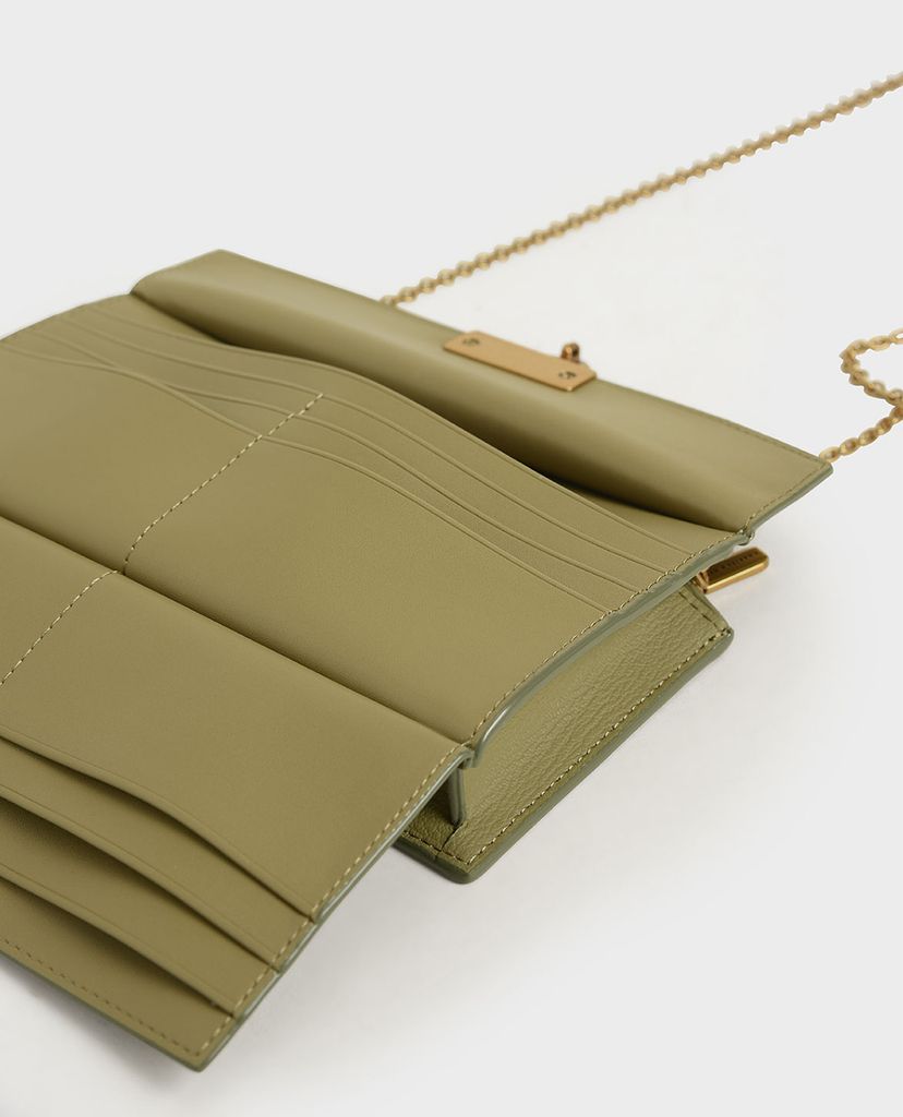 CHARLES & KEITH - Ví cầm tay nữ dáng dài Metallic Accent