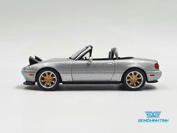 Xe Mô Hình Mazda Miata MX-5 (NA) Tuned Version Silver Stone Metallic LHD 1:64 MiniGT (Xám)