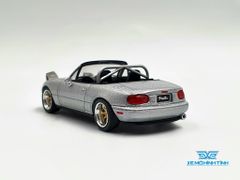 Xe Mô Hình Mazda Miata MX-5 (NA) Tuned Version Silver Stone Metallic LHD 1:64 MiniGT (Xám)