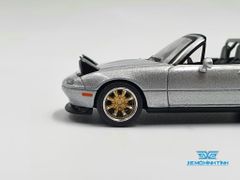 Xe Mô Hình Mazda Miata MX-5 (NA) Tuned Version Silver Stone Metallic LHD 1:64 MiniGT (Xám)