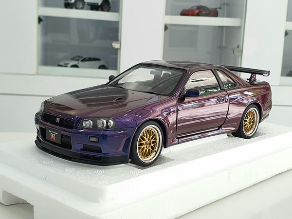 Xe Mô Hình Nissan Skyline GT-R ( R34 ) V-SPEC II 1:18 AUTOart ( Tím Biến Màu )