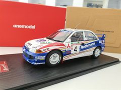 Xe Mô Hình Mitsubishi Lancer Evolution III WRC #4 1:18 One Model ( Trắng Xanh )