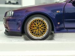 Xe Mô Hình Nissan Skyline GT-R ( R34 ) V-SPEC II 1:18 AUTOart ( Tím Biến Màu )