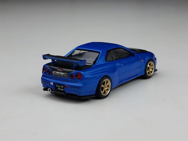 Xe Mô Hình Nissan Skyline GT-R (R34) Top Secret Bayside Blue RHD 1:64 MiNiGT ( Xanh )
