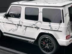 Xe Mô Hình Mercedes Benz G63 AMG 2019 Limited 66 1:18 Motorhelix ( Trắng Hoa Văn )