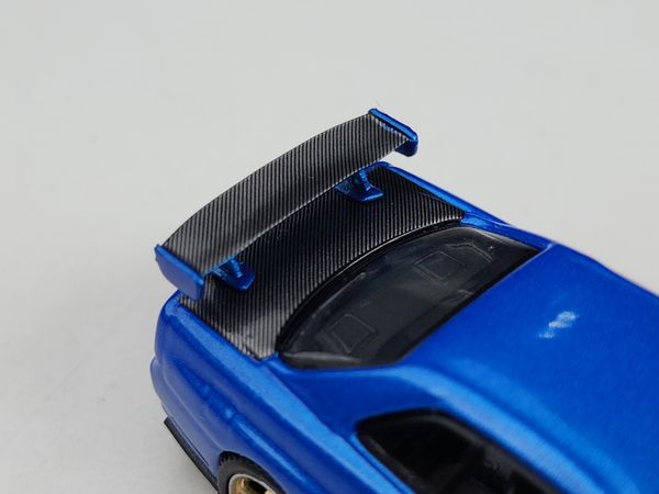 Xe Mô Hình Nissan Skyline GT-R (R34) Top Secret Bayside Blue RHD 1:64 MiNiGT ( Xanh )