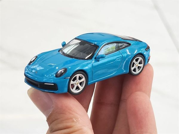 Xe Mô Hình Porsche 911 (992) Carrera S Miami Blue LHD 1:64 Minigt ( Xanh Ngọc )