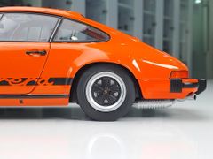 Xe mô hình Porsche 911 3.0 Carrera Orange 1977 1:18 Solido (Cam)