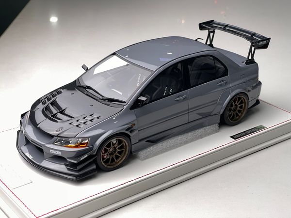 Xe Mô Hình Mitsubishi Voltex 1:18 One Model (Xám)