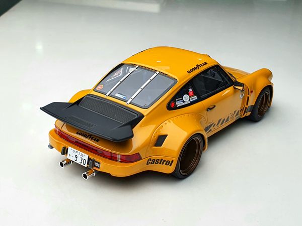 Xe Mô Hình Porsche 911 RSR Y-San 1:18 GtSpirit ( Vàng )