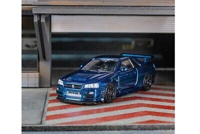 Xe Mô Hình Nissan Skyline GT-R (R34) CLDC Magazine Edition 1:64 INNO ( Xanh Carbon )