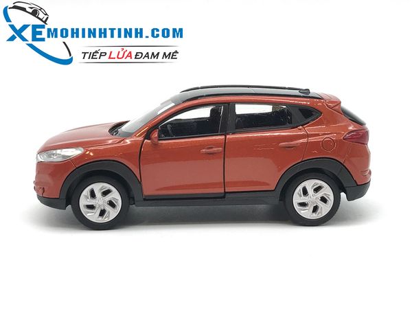 HỘP XE MÔ HÌNH Hyundai Tucson WELLY 1:36 (Cam )