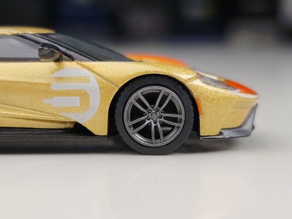 Xe Mô Hình Ford GT Holman Moody Heritage Edition LHD 1:64 MiNiGT ( Vàng Đồng )