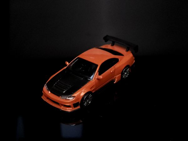 Xe Mô Hình Nissan Silvia S15 D-MAX 1:64 MiniGT ( Metallic Orange RHD )