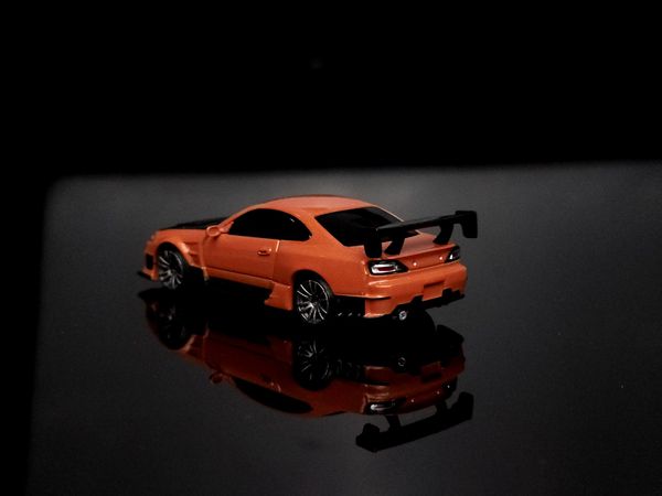 Xe Mô Hình Nissan Silvia S15 D-MAX 1:64 MiniGT ( Metallic Orange RHD )