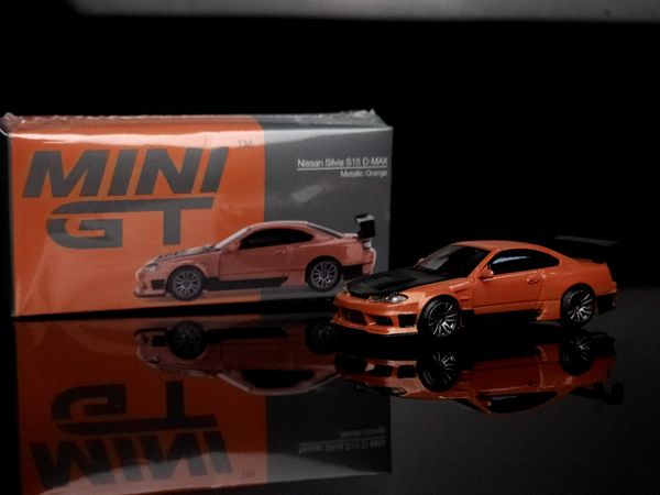 Xe Mô Hình Nissan Silvia S15 D-MAX 1:64 MiniGT ( Metallic Orange RHD )