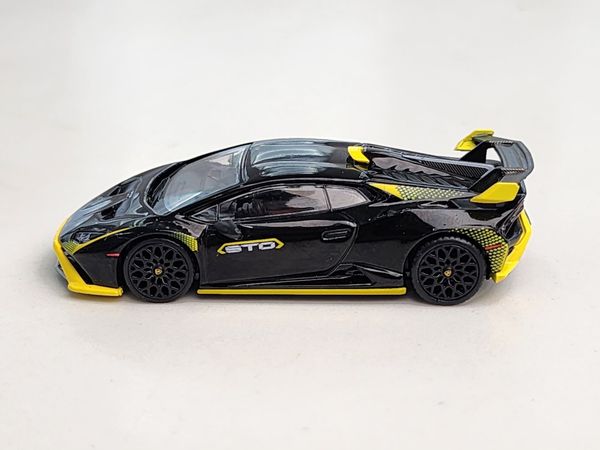 Xe Mô Hình Lamborghini Huracan STO Nero Noctis LHD 1:64 MiniGT ( Đen Viền Vàng )