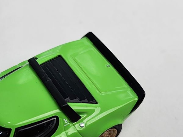 Xe Mô Hình Lancia Stratos HF Stradale Verde Chiaro LHD 1:64 MiniGT ( Xanh Dạ Quang )