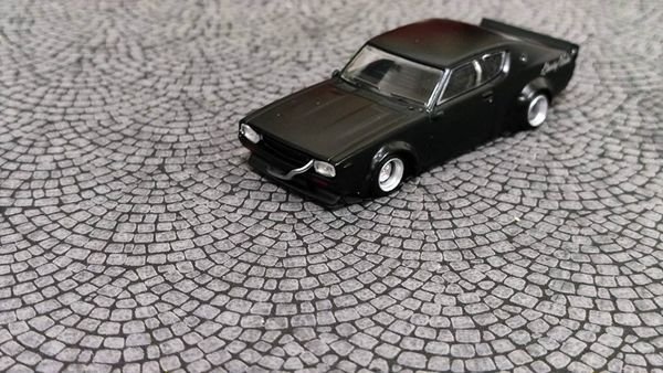 Xe Mô Hình Nissan Skyline Kenmeri Liberty Walk 1:64 MiniGT ( Đen )