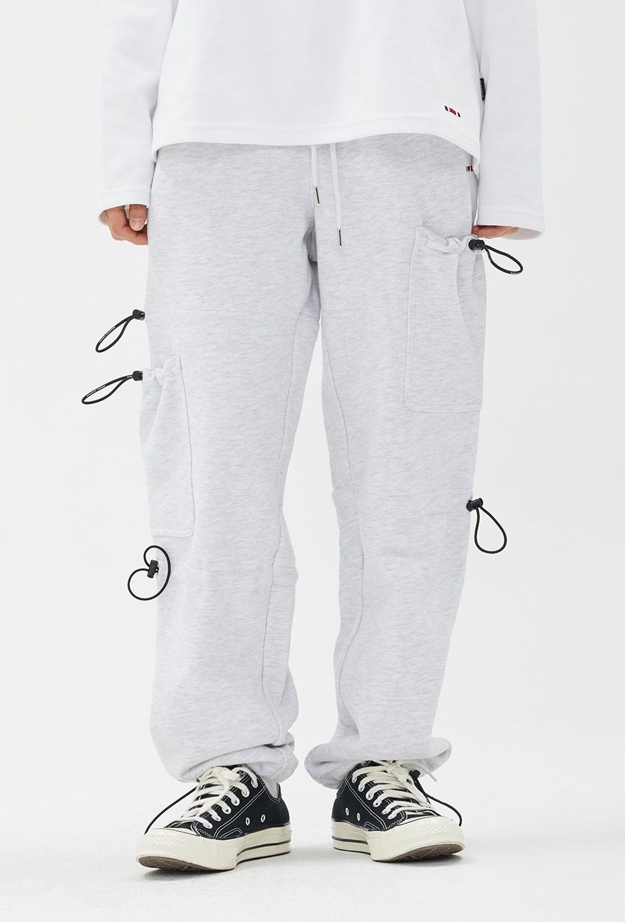  Quần Jogger RMTCRW [ROMANTIC CROWN] - UNBALANCE POCKET SWEAT PANTS LIGHT GREY 