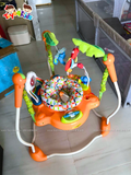 Ghế nhảy Jumperoo Rainforest màu cam, chân cong