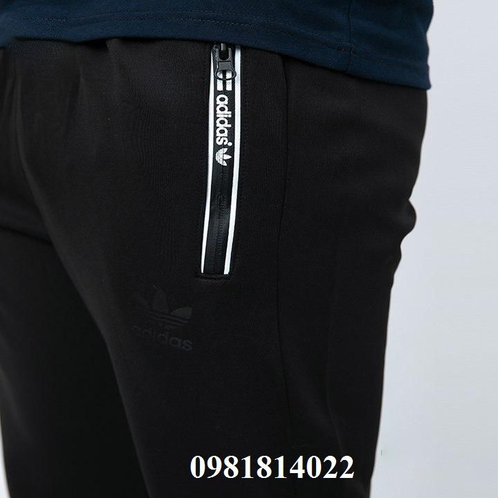 Quần thể thao khóa kéo in chữ Nike