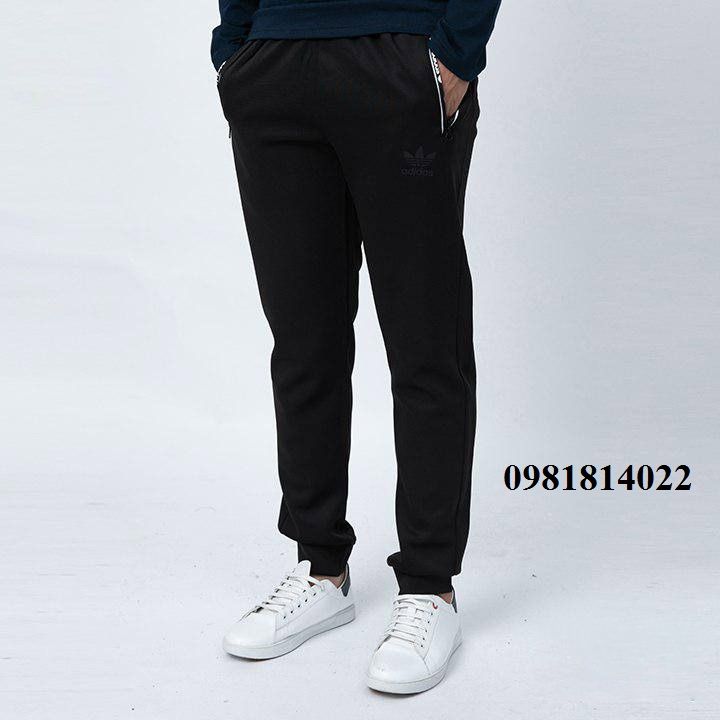 Quần thể thao khóa kéo in chữ Nike