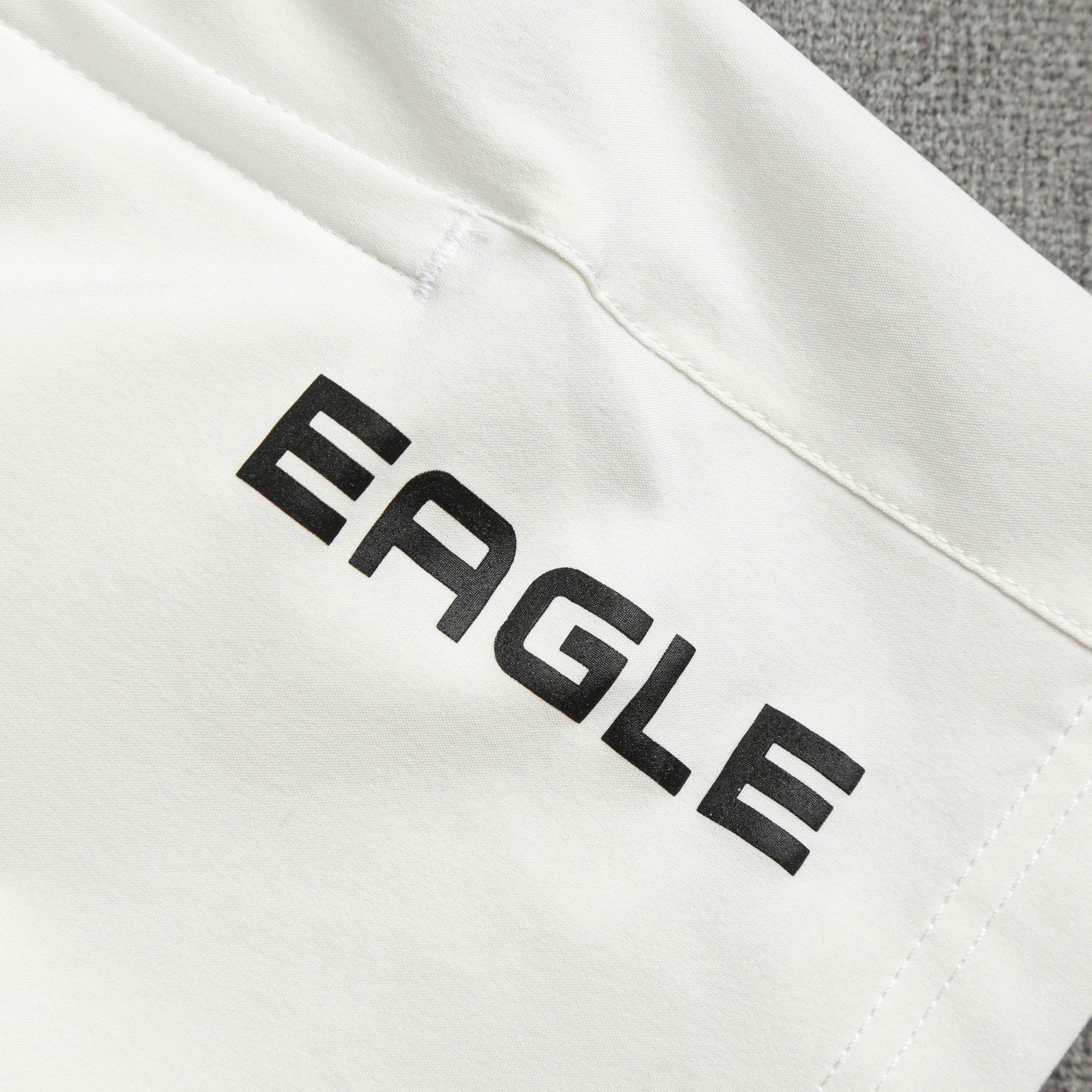 Quần đùi dù nam Eagle Running - Trắng